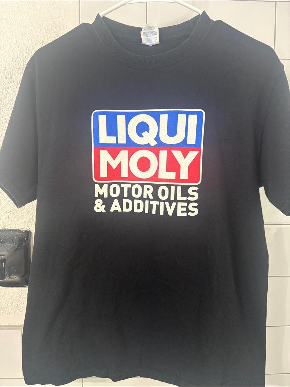 Port and Company Black Liqui Moly Logo Tee with Blue & Red Accents